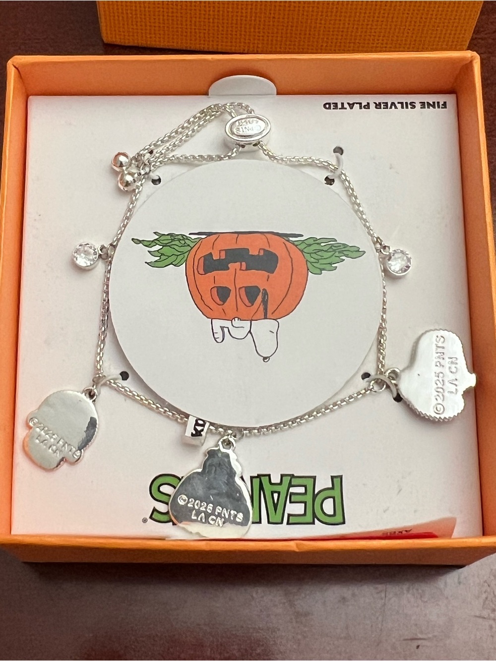 Peanuts Silver-Tone Kids Bracelet with Red and Orange Halloween Charms - Picture 3 of 4